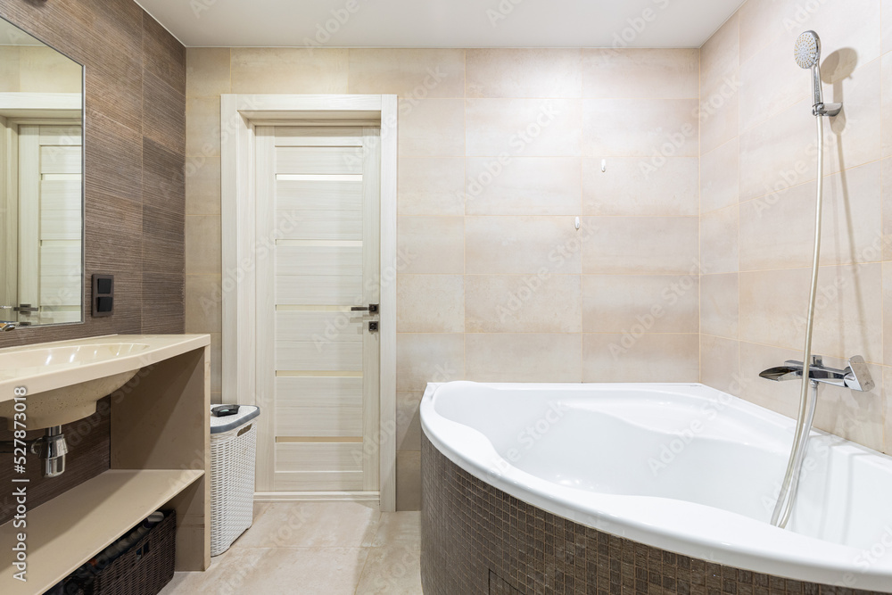 Jacuzzi and shower in the bathroom in the apartment Jacuzzi and shower in the bathroom in the apartment