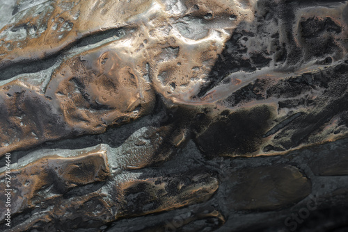 Bronze texture for backgrounds. Grunge metal background close-up
