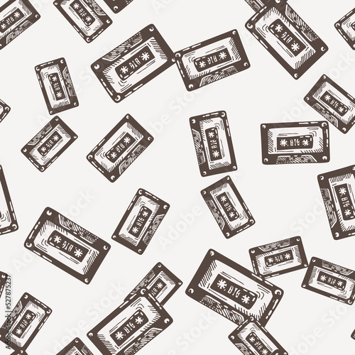 Audio cassette tape engraved seamless pattern. Vintage music cassette tape in hand drawn style.
