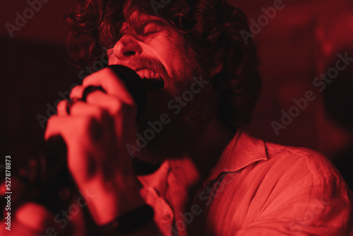 Man singing with a rock band