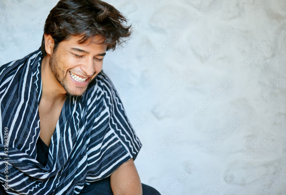 Stylish Hispanic model with clasped hands at home Stylish Hispanic model with clasped hands at home