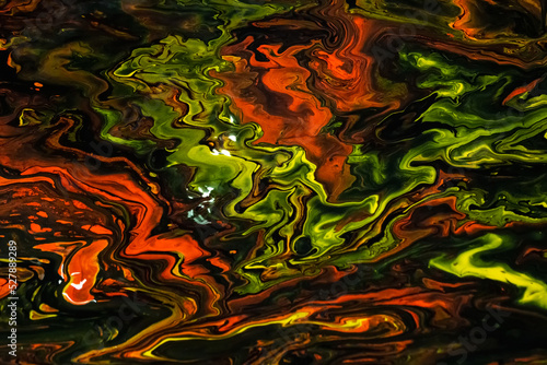 Liquid colorful dark resin art abstract background. Epoxy resin photo