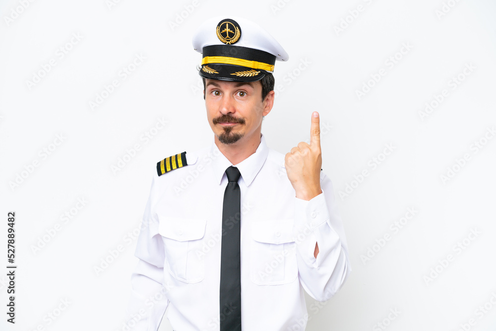 Airplane caucasian pilot isolated on white background pointing with the index finger a great idea Airplane caucasian pilot isolated on white background pointing with the index finger a great idea