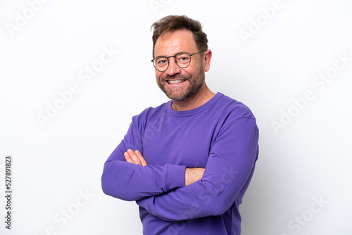 Middle age caucasian man isolated on white background with arms crossed and looking forward © luismolinero