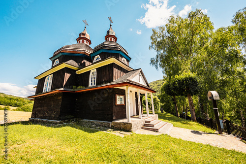 Greek Catholic wooden temple of the Protection of the Holy Virgin in Komarnik near Svidnik. Wooden churches in Slovakia photo