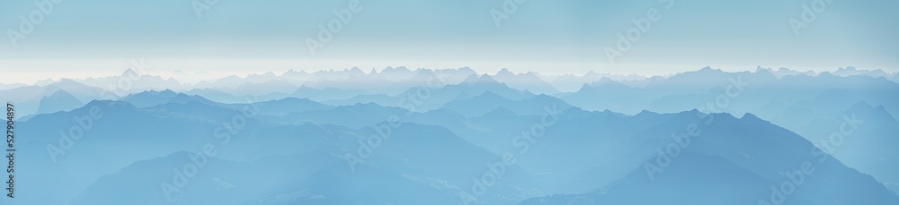 Switzerland, Panoramic view of Foggy mountain summits at dawn, near Santis
