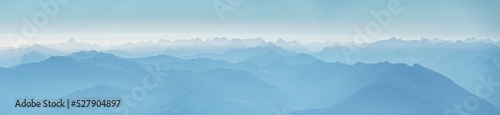 Switzerland, Panoramic view of Foggy mountain summits at dawn, near Santis