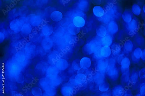 Bokeh or blurry background of a portrait lens. Defocused back. Cold neon tone