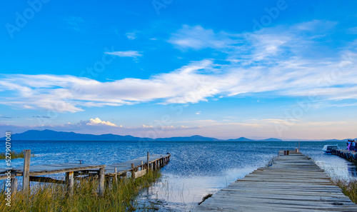 docks on the blue lake arilla at sunset