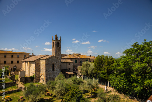 Fotografie, Obraz A church in the small hilltop walled medieval village of Monteriggioni in Tuscany, Italy, Europe