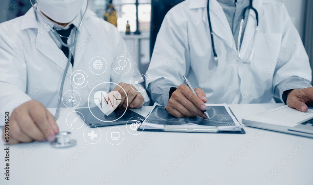 Medicine doctor using digital healthcare and network connection on hologram modern virtual screen interface icons, Medical technology futuristic concept. Medicine doctor using digital healthcare and network connection on hologram modern virtual screen interface icons, Medical technology futuristic concept.