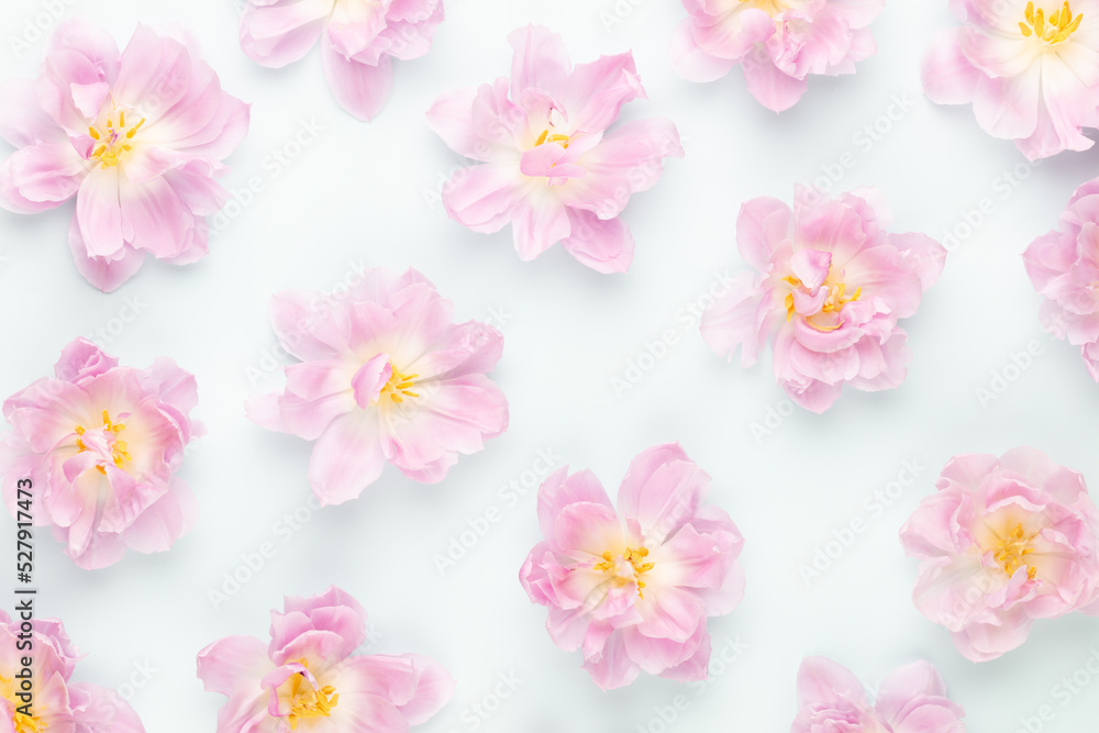 Pink tulips blossom pattern on pastel background.