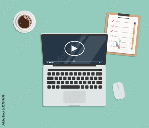 illustration of a laptop computer with icons, video player icon on computer, concept of webinar, business online training, education or e-learning and video tutorial, vector flat design illustration