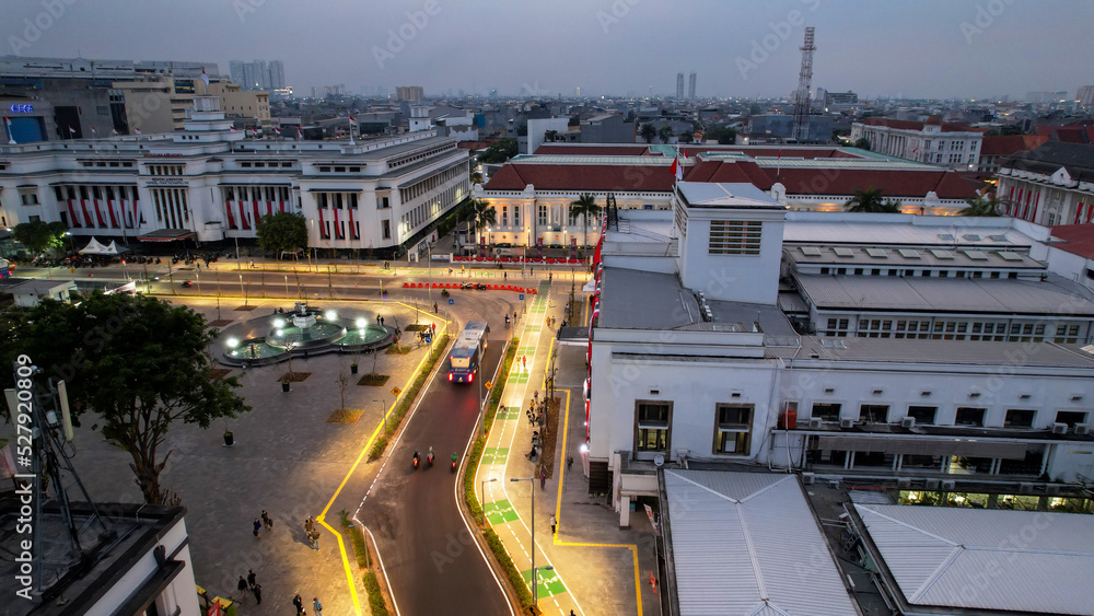 Aerial View of Fatahilah museum at Old City at Jakarta, Indonesia. With Jakarta cityscape and noise cloud when sunset. Jakarta, Indonesia, September 2, 2022