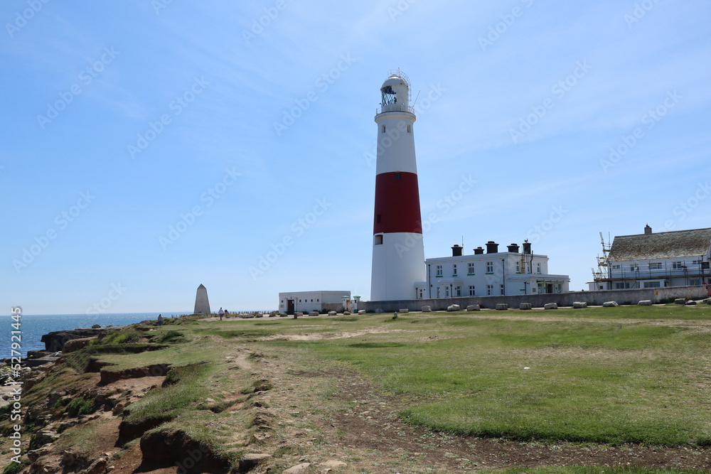 The distinctive red and white striped lighthouse at Portland Bill in Dorset, England