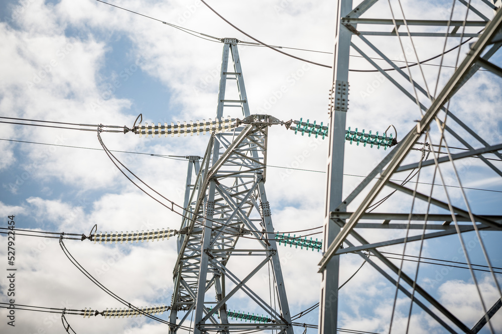 power grid lines to simulate electricity costs, inflation and energy shortage around the world. Infrastructure and technology concept. power grid lines to simulate electricity costs, inflation and energy shortage around the world. Infrastructure and technology concept.