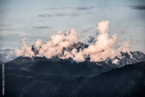 Low clouds on top of a mountain in the Northern Italy near Lake Como