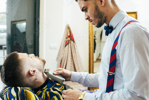 Barber working in a barbershop