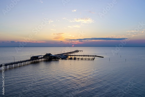 The Fairhope, Alabama municipal pier at sunset