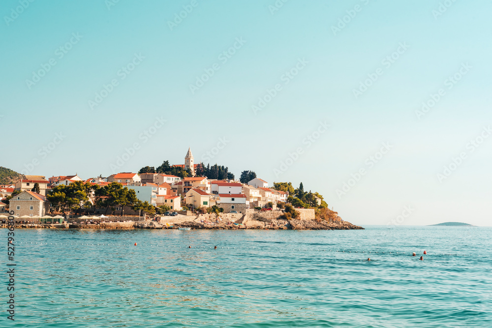 Cityscape of Primosten peninsula and clear blue sky and sea. Croatia, Primosten