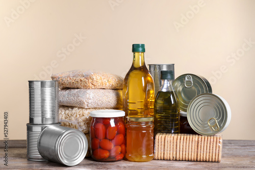 Fototapeta Naklejka Na Ścianę i Meble -  Different products on wooden table. Food donation