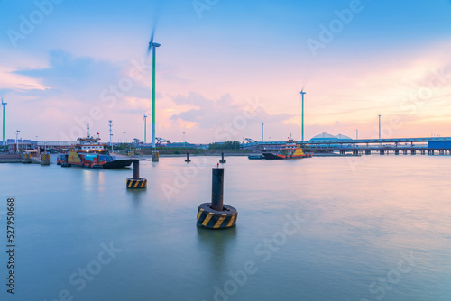 Yangtze River port wharf and wind turbine and sunset scenery in Jiangyin City  China