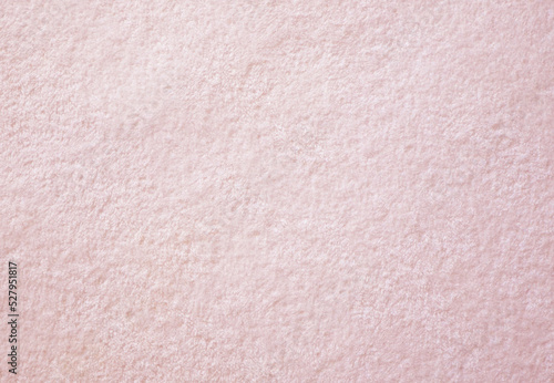 Pastel pink towel blanket texture background. Soft and fluffy fabrics.
