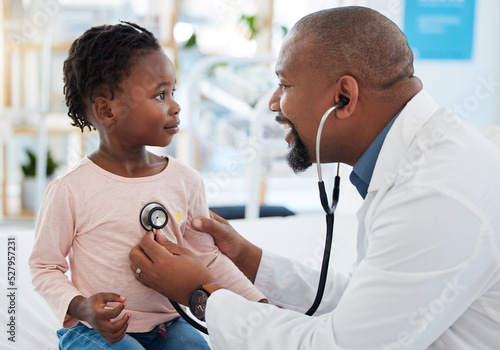Pediatrician, consulting and stethoscope for lungs or chest checkup with doctor in medical healthcare hospital or clinic. Medicine, young patient and black man therapist listening to heart of baby