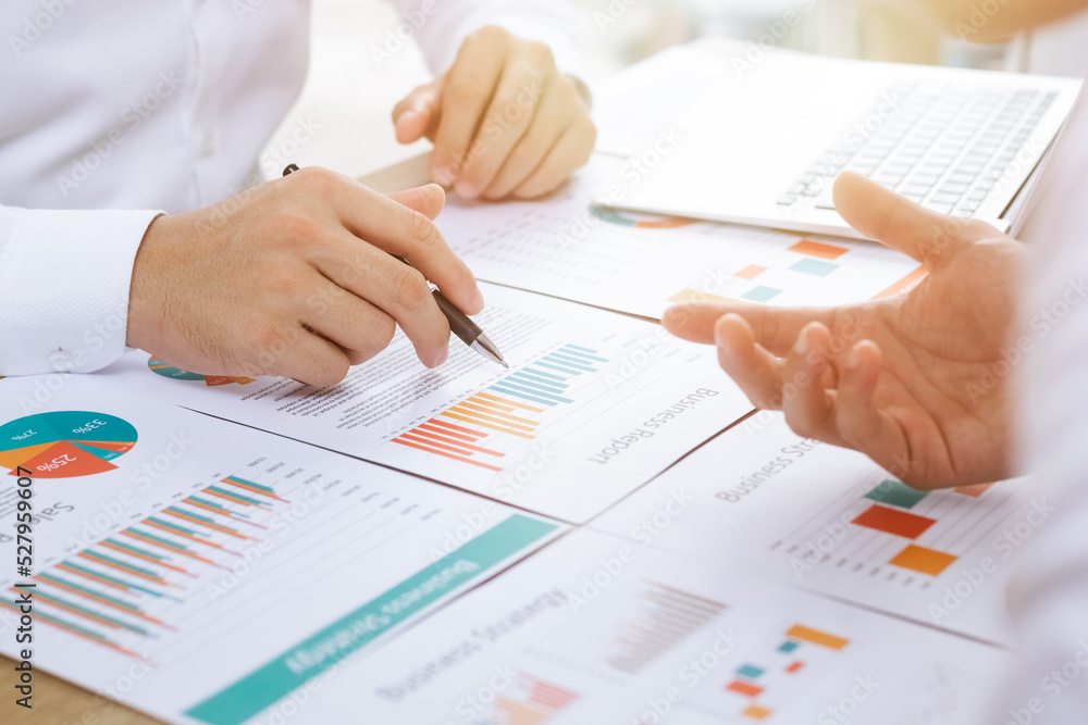 business teamwork Calculating Profit and Cost with Calculator, Growth Chart Analysis and Investing ,Business planning and strategies to maximize sales profits, long-term plans. business teamwork Calculating Profit and Cost with Calculator, Growth Chart Analysis and Investing ,Business planning and strategies to maximize sales profits, long-term plans.