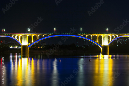brige over river at night