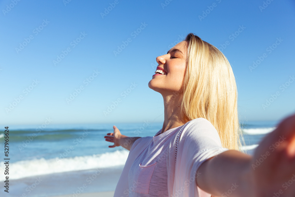 Caucasian woman enjoying at beach