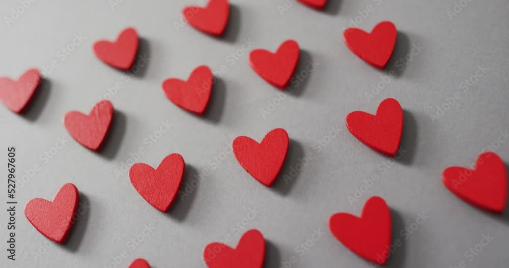 Red wooden hearts on gray background at valentine's day Red wooden hearts on gray background at valentine's day