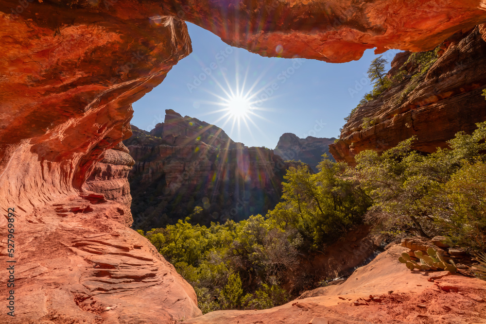 Landscape taken from inside small tunnel with sun shining near Sedona Arizona