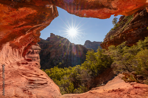 Obraz na płótnie Landscape taken from inside small tunnel with sun shining near Sedona Arizona w salonie