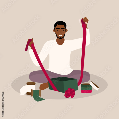 Young man wrapping gifts for holidays vector