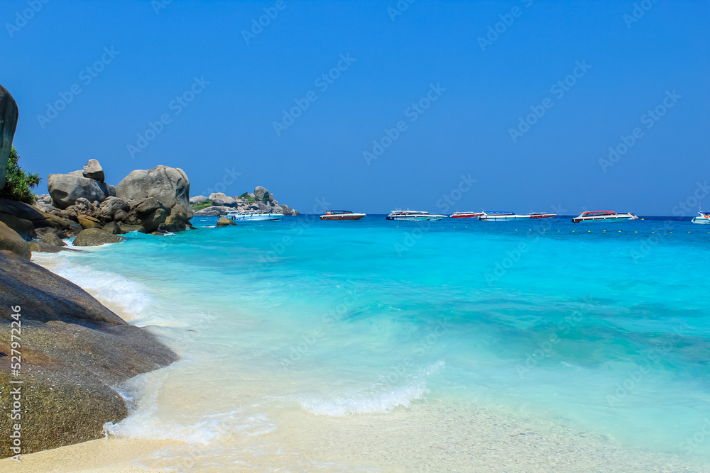 Granite rocks on the shores of Koh Similan, Phuket, Thailand, magnificent turquoise blue waters, blue skies with copy space for text, background, wallpaper Granite rocks on the shores of Koh Similan, Phuket, Thailand, magnificent turquoise blue waters, blue skies with copy space for text, background, wallpaper