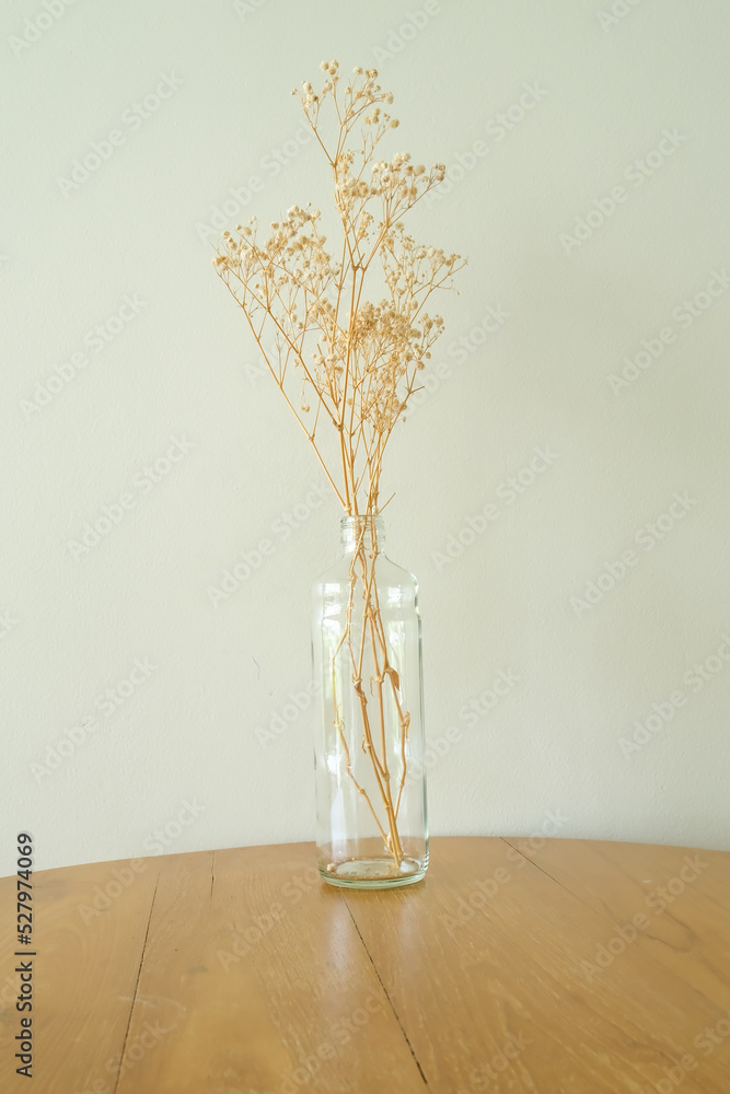 glass vase on a wooden table