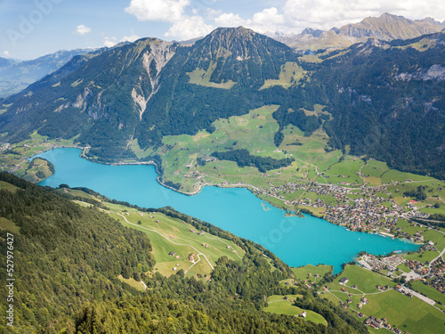 Fototapeta Naklejka Na Ścianę i Meble -  Aerial image of Lake Lungern Valley vewi from Turren peaks in the Swiss Alps, Switzerland