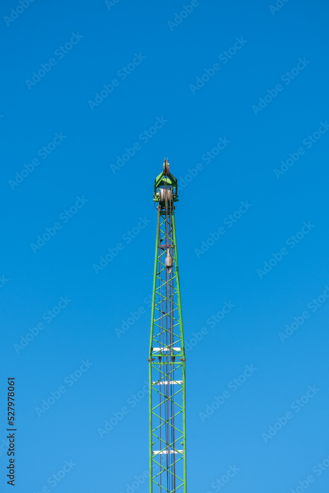 blue sky background and tower crane 