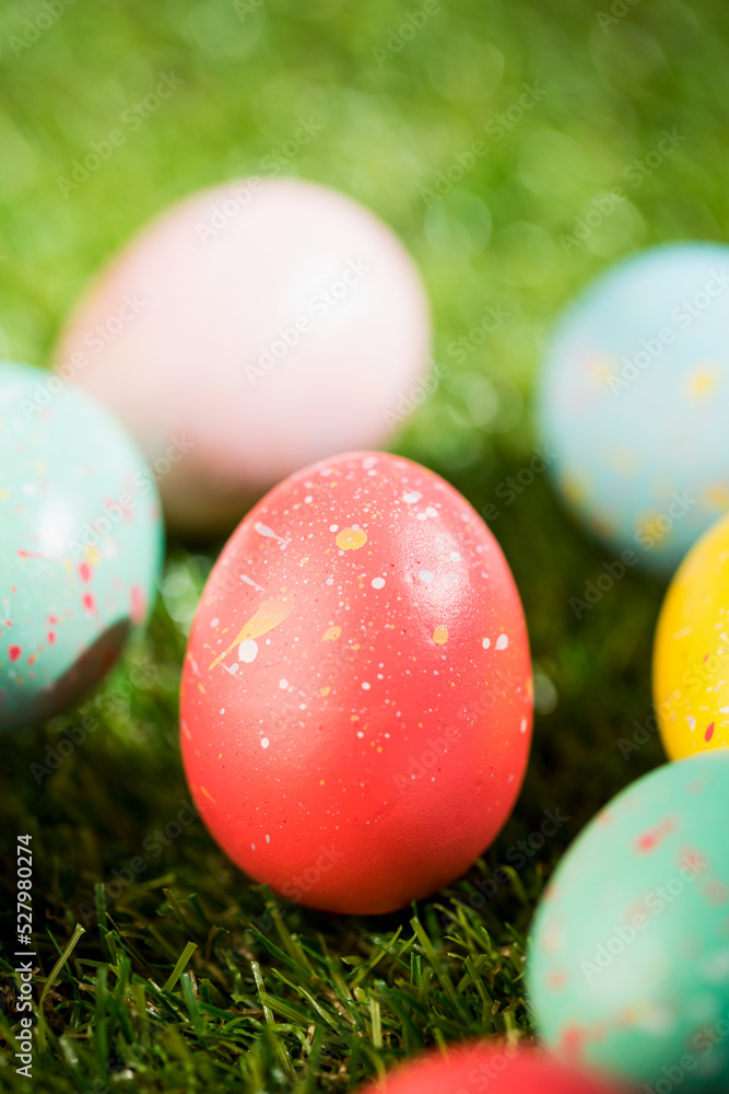 Various Easter eggs on grass