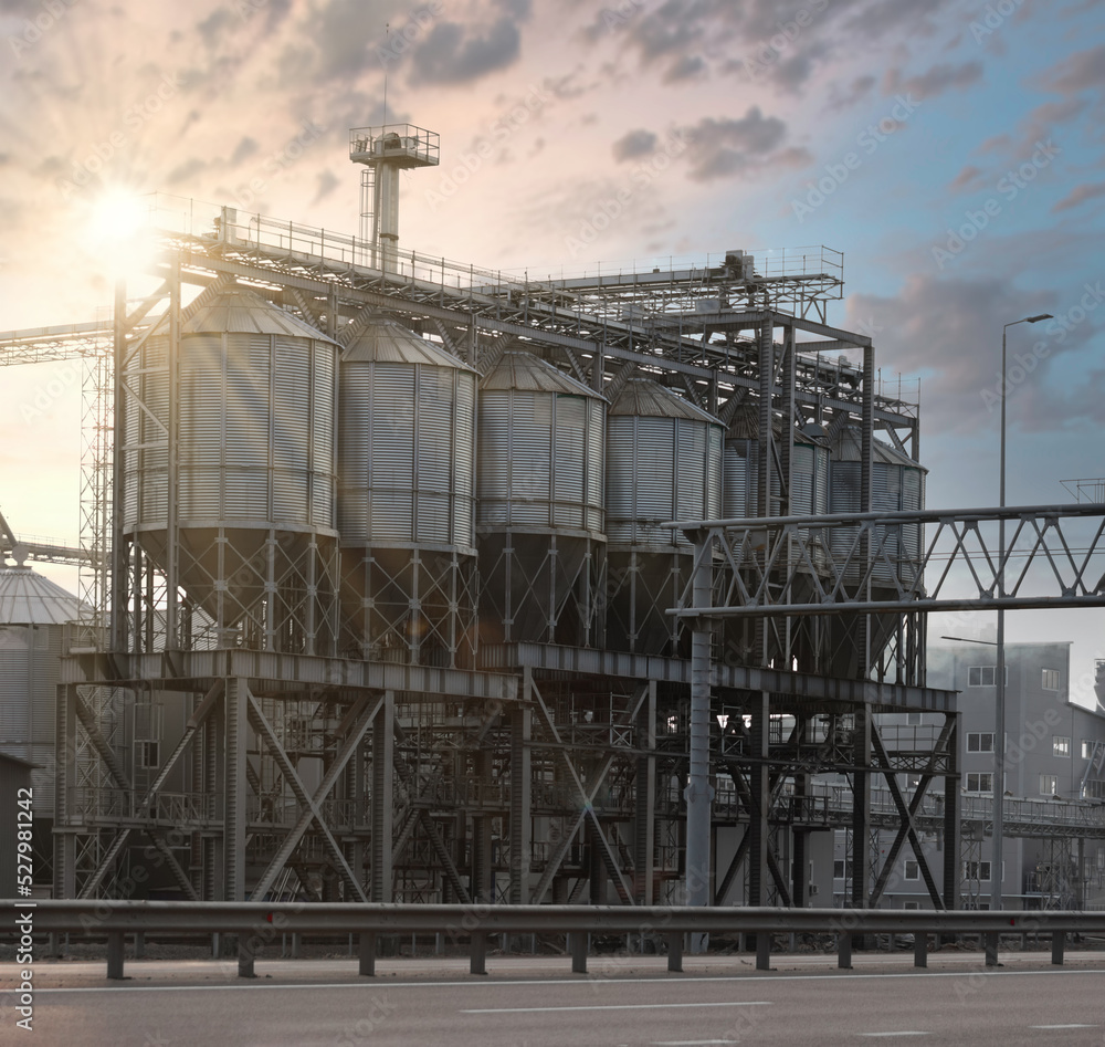 Elevator tanks for grain storage, drying and processing. Agricultural grain factory. Elevator tanks for grain storage, drying and processing. Agricultural grain factory.