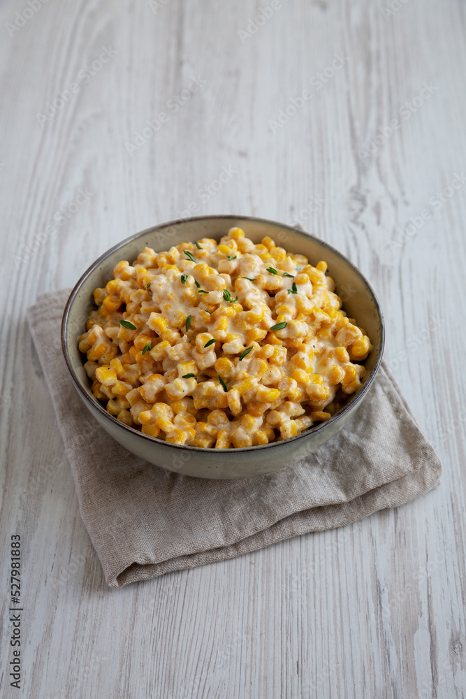 Homemade Slow Cooker Creamed Corn in a Bowl, side view. Homemade Slow Cooker Creamed Corn in a Bowl, side view.
