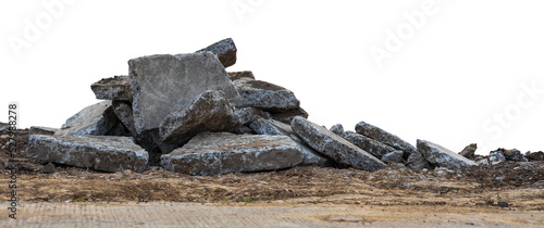 Low View Isolate Debris of large concrete blocks are piled up on the mounds of road demolition for renovations, which are common during the summer in rural Thailand.