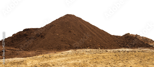 View of isolates of brown ray loam piled up like mountains on yellow sandy soil prepared to fill the area and use as organic material for forest plantations. photo