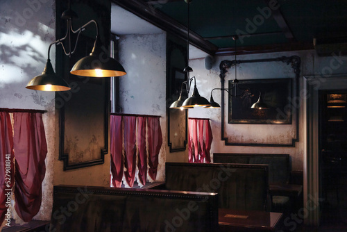 Background retro vintage interior pub, cafe, bar or restaurant in old city district. Concept design interior and stylish wallpaper. Copy text space