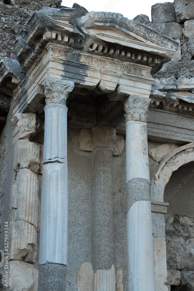 Historical building with marble columns  .Elements of architectural decoration of buildings.Ruins of ancient city.