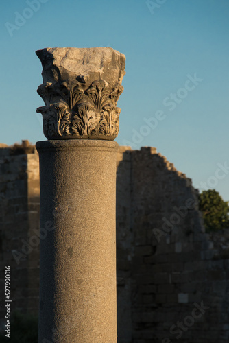 Historical building with marble columns. Elements of architectural decoration. Ancient city ruins.
