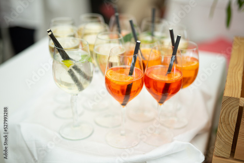 Alcoholic beverages at a wedding. Glasses and drinks at an event.