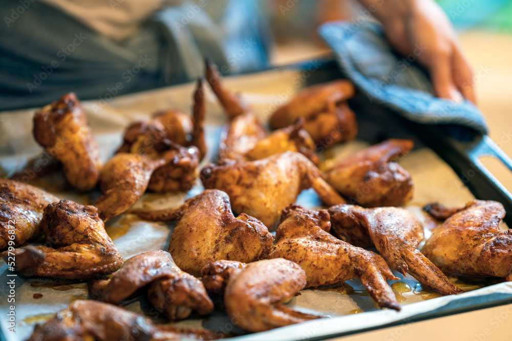 Home cooked chicken wings. Food and eating concept. Home cooked chicken wings. Food and eating concept.