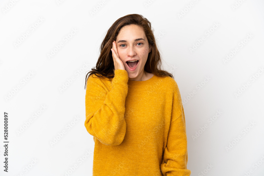 Young caucasian woman isolated on white background with surprise and shocked facial expression Young caucasian woman isolated on white background with surprise and shocked facial expression